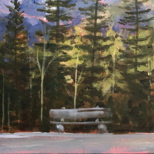 Purple mountains in the background compliment pine and other trees in the middle area. Three is a bridge on the left and a bench on the right in the foreground.